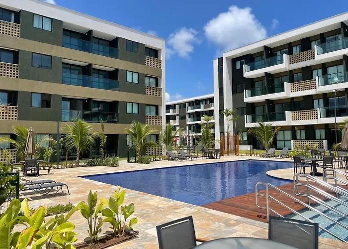 Flat ESTUDIO de LUXO - Praia de Muro Alto - Piscinas - Ideal para CASAIS, famílias com crianças - ap COMPLETO - AR COND, WI FI, NETFLIX, ESTACIONAMENTO - 400 mt do MAR